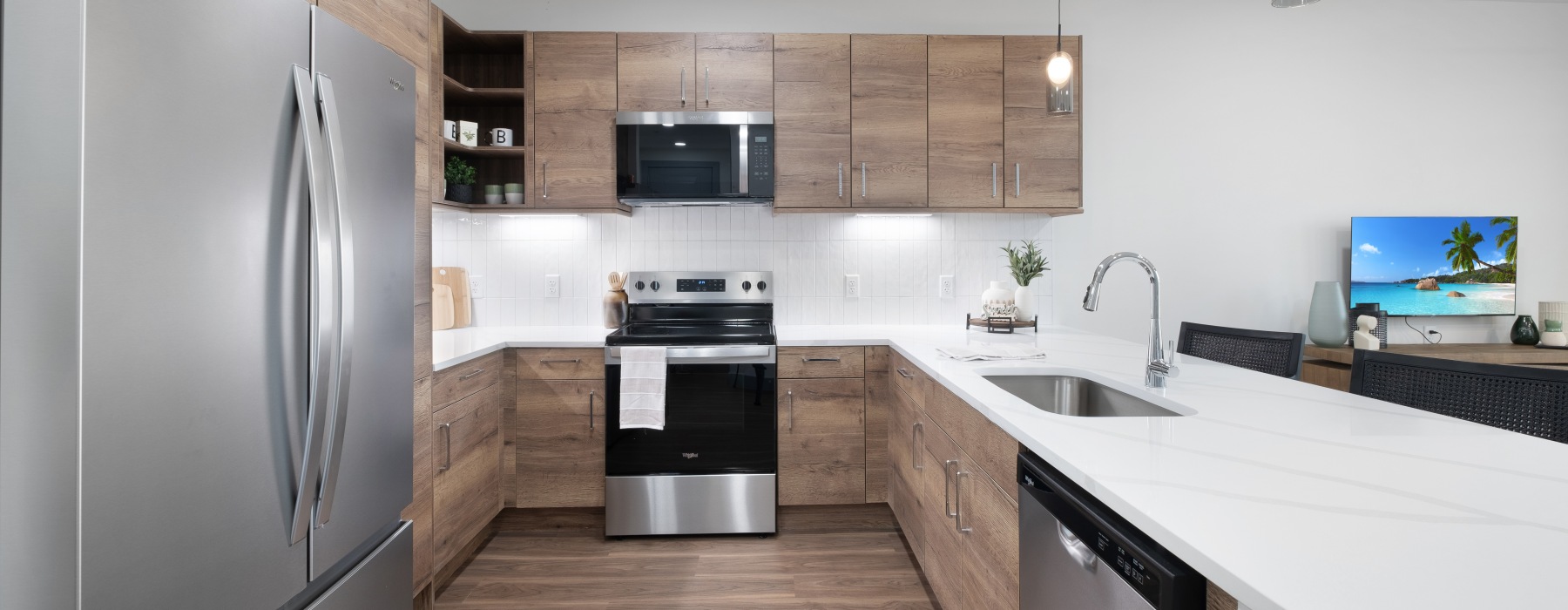 Luxury kitchen with contemporary cabinetry and spacious countertops