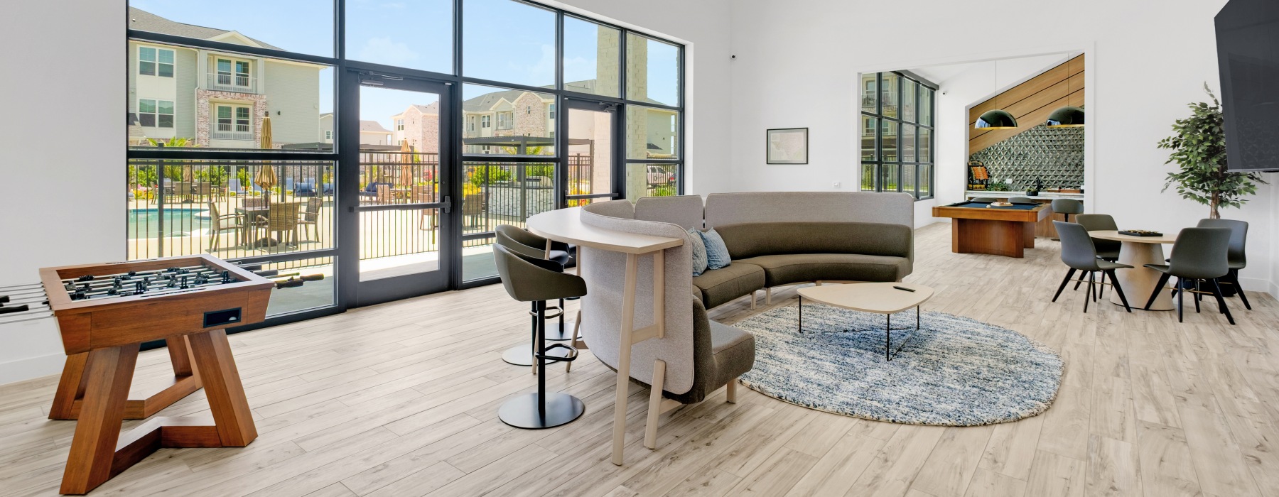 Contemporary apartment clubroom at Brickyard at Barbers Hill