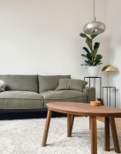 a living room with a couch and a coffee table
